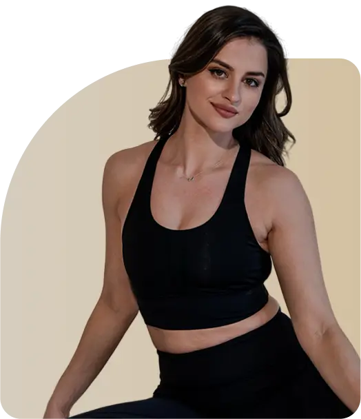 Fitness enthusiast in black sportswear, highlighting a healthy lifestyle and wellness.